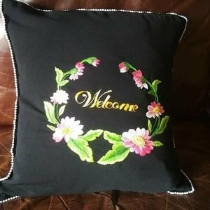 Hand embroidered cushion